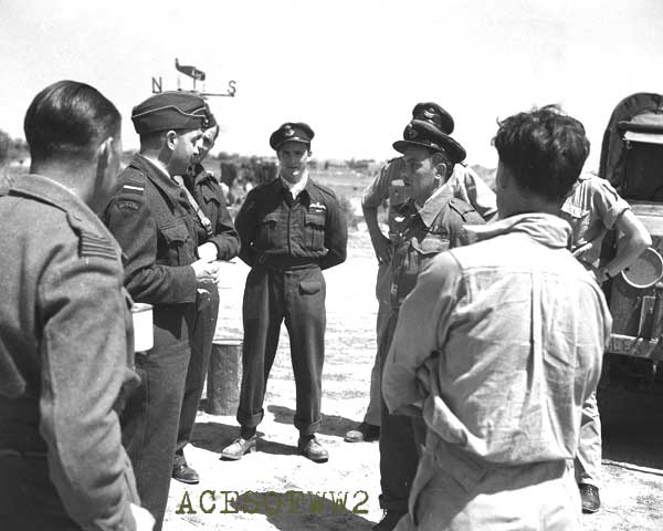 Fenwick [center] watches as AVM Curtis "interogates" Doug Husband at Paddington, 1943
