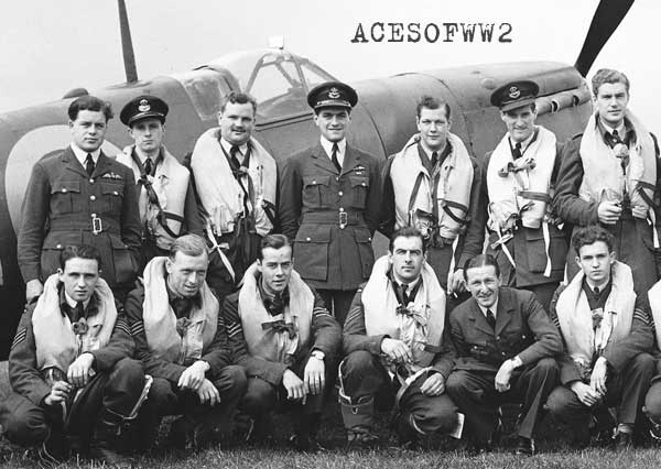 403 Sq. Hornchurch, Sept 24, 1941 Left to Right - Kneeling - Sgt. Charlie Grigg of Mount Brydges, Ont., Sgt. Lawrence Soanes (RAF), Sgt. John Rainville of St. Johns, Que., Sgt. Hugh Belcher of Roblin, Man., F/O C. A. Hyde Bray (RAF), Sgt. Eric Crist of Wallaceburg, Ont. Standing - P/O Derick Colvin (RAF), P/O Cryil Wood (RAF), F/L Ted Cathelo of Vancouver, B.C., S/L Tony Lee-Knight (RAF), F/L B. S. Christmas, of Montreal, Que., P/O Phil Carrillo of New York City, P/O Don Ball of Edmonton, Alta.