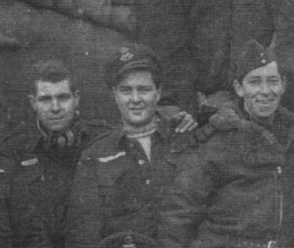 Denny Wilson flanked by 411 squadron mates Gardiner & Young - December 1944